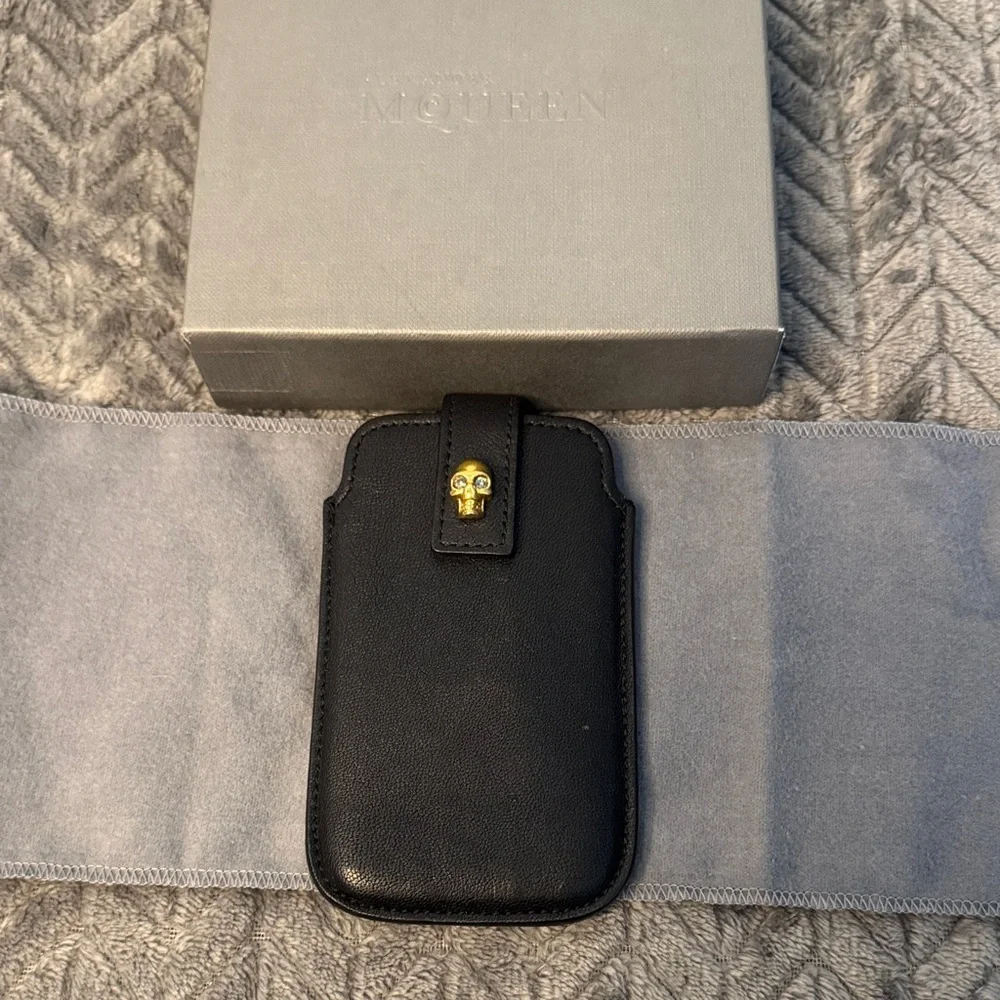 Alexander McQueen Black Phone Holder with Gold Skull Detail